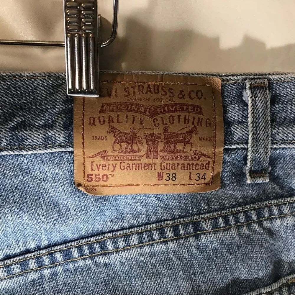 Levi's 550 Relaxed Fit Tapered Blue Wash Jeans Sz 38x34 USA
